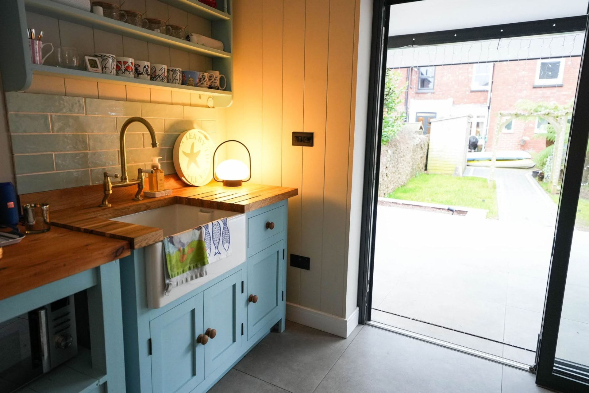 House extension: garden room kitchenette, completed work, supplied project photograph