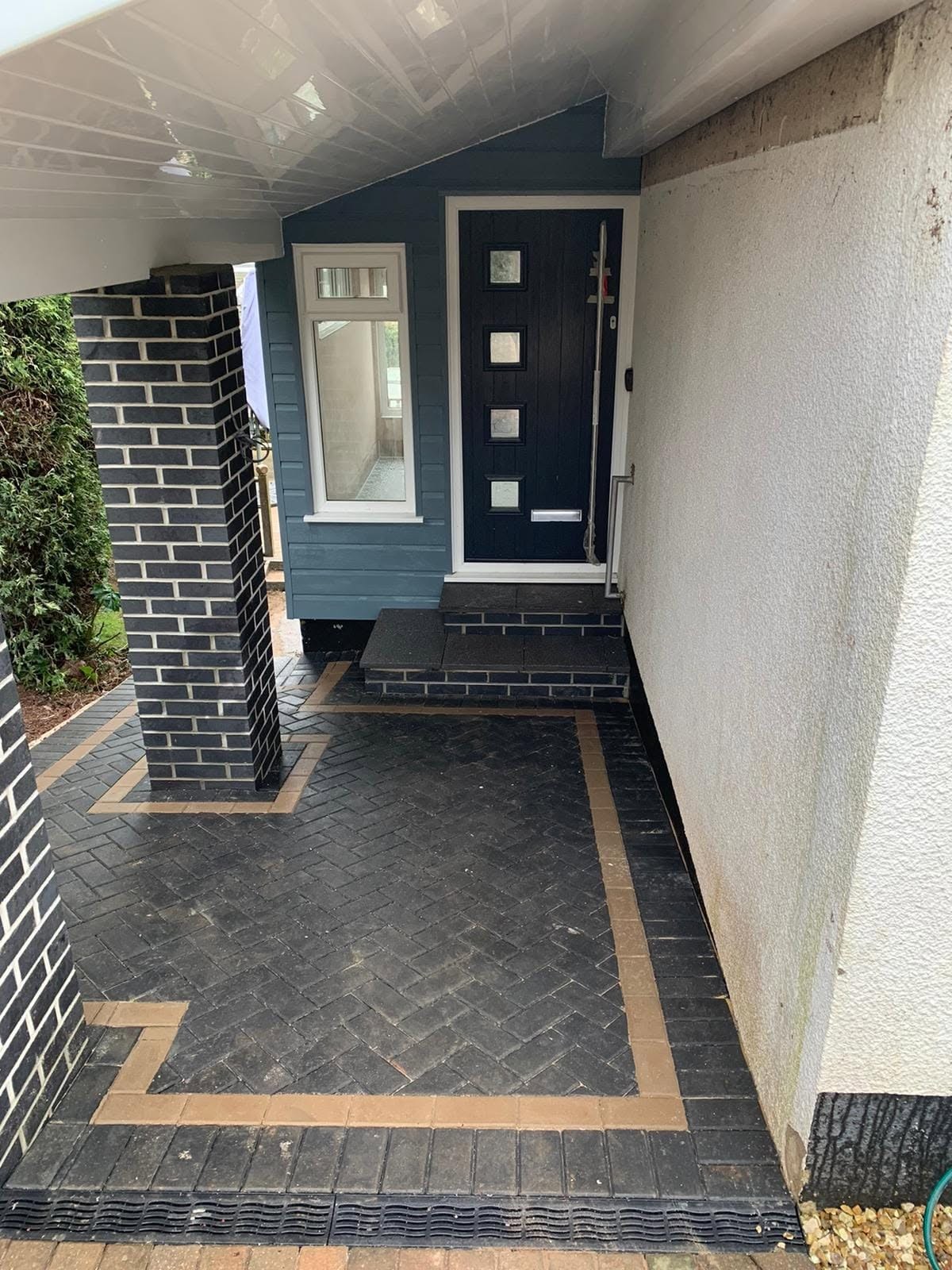 Landscaping: herringbone paved path, completed work, supplied project photograph